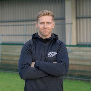 Benchmark coach in club grounds